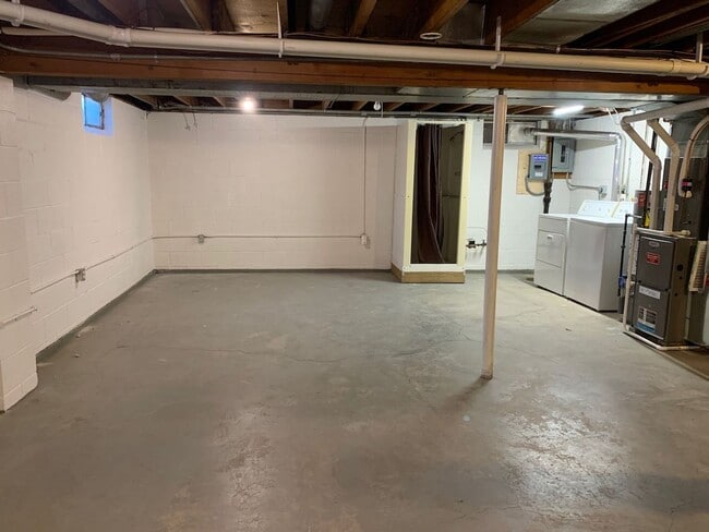 Building Photo - Updated 2BR/1.5BA with garage, lawn care included