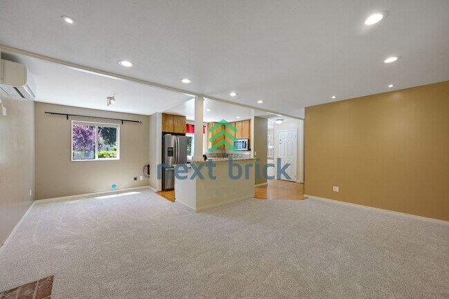 Building Photo - Discover Spacious Comfort for multi-generational living: 4-Bedroom Home with additional kitchenet...