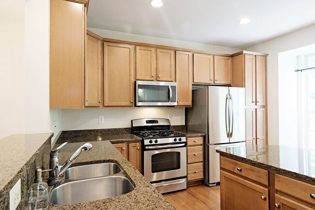 Building Photo - Dog-Friendly 4BR Cherry Hill Townhome with 2-Car Garage