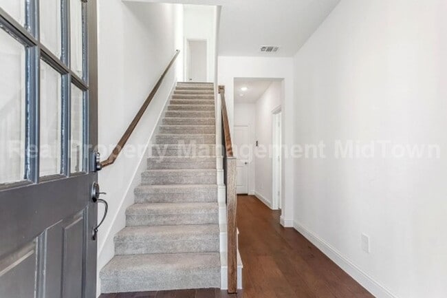 Building Photo - Live Elevated in the Heart of Viridian – S...