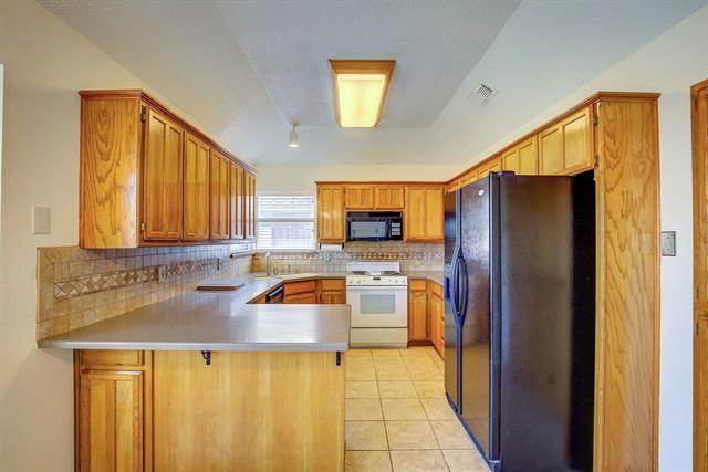 Building Photo - 7909 Tree Leaf Ln