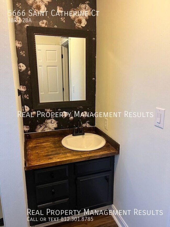 Building Photo - 5666 St Catherine Ct