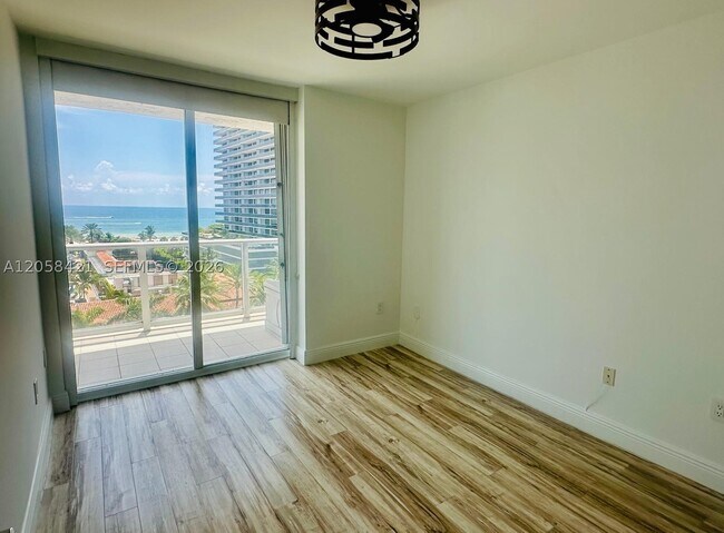 Building Photo - 5900 Collins Ave