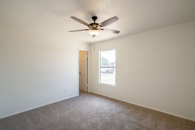 Building Photo - Updated home with large backyard & 2 car g...