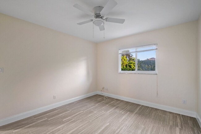 Building Photo - ANNUAL RENTAL - 2 Bedroom, 1 Bath w/ Garag...
