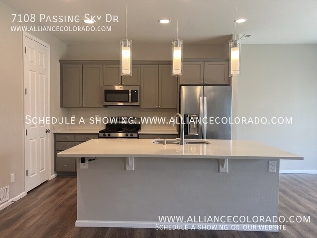 Building Photo - 7108 Passing Sky Dr