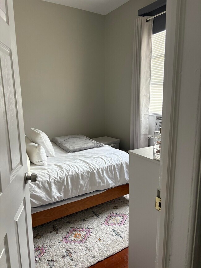 Building Photo - 121-123-123 W 25th St