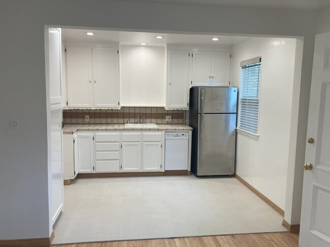 Kitchen with fridge - 2273 Fox Hills Dr