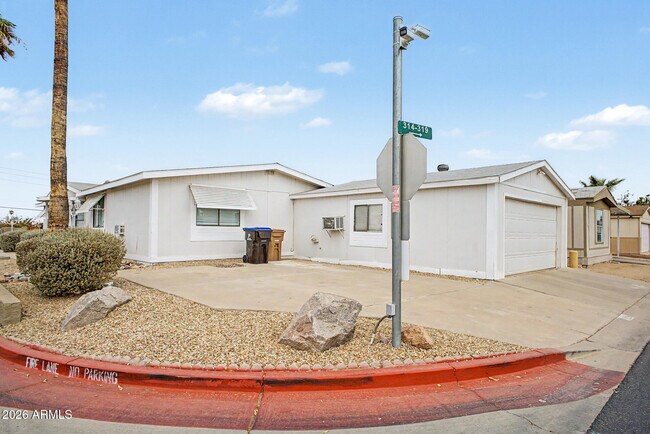Building Photo - 8601 N 103rd Ave