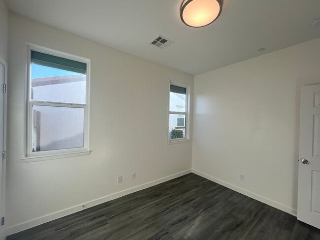 Building Photo - Single-story 1326 sq ft, townhome built in 2019 w/3 bed, 2 bath & spacious attached 2-car garage ...