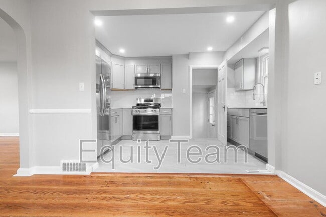 Building Photo - 6819 Elwynne Dr