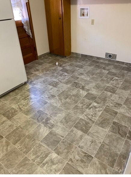 New kitchen floor - 4605 Otis St