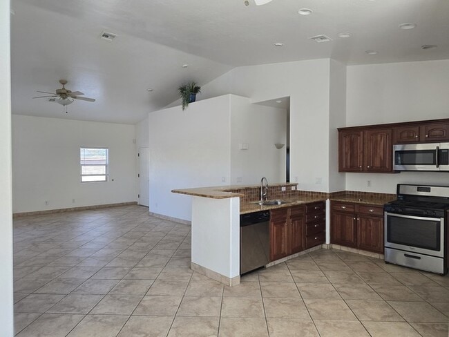 Building Photo - Spacious East Side Oasis – 4 Bed, 2 Bath Home with Premium Upgrades!
