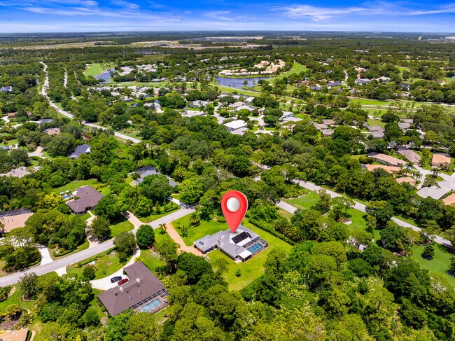 Building Photo - 7903 Plantation Lakes Dr