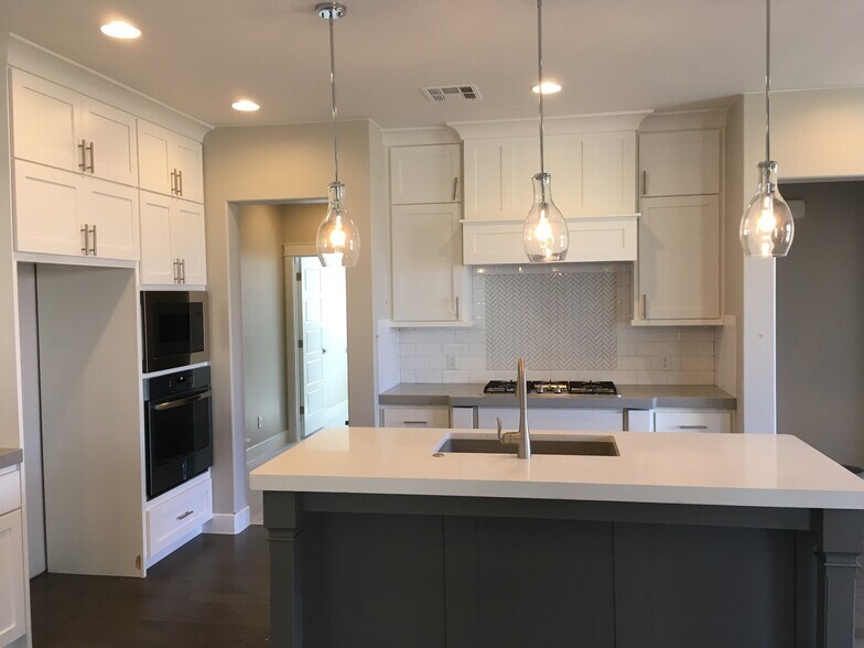 another view of the kitchen, doorway on left leads to mudroom, garage, pantry, half-bath and laundry room - 3952 S Saddleback Rd