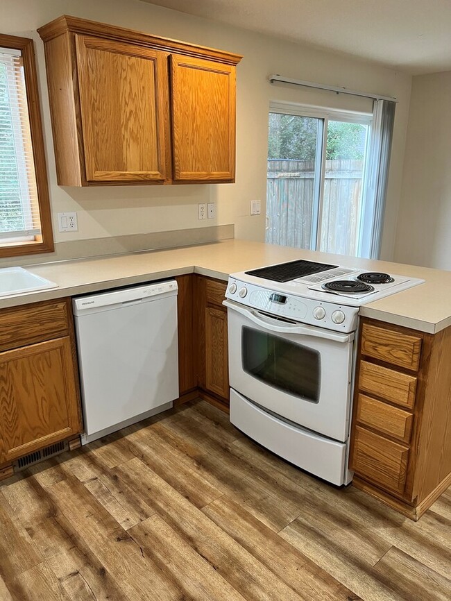 Building Photo - Beautiful Home with LVP Flooring, W/D, Garage, Back Yard, and MORE!