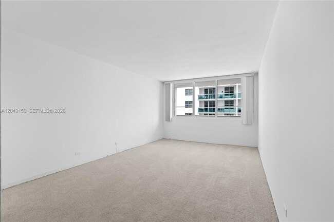 Building Photo - 5005 Collins Ave