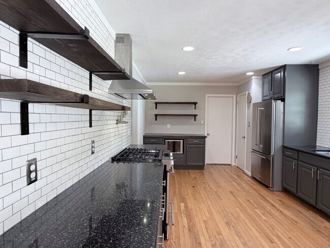 Building Photo - Updated 3BR Home in Beaver Lake | Fenced Yard, Garage, Covered Porch & Outdoor Fireplace | Pet Fr...