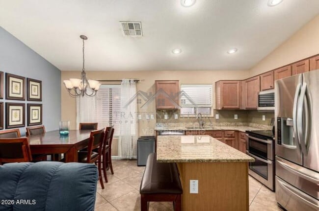 Building Photo - 41793 W Sunland Dr