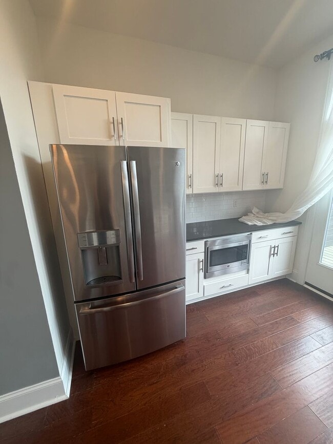 Building Photo - Luxury 3 Bedroom Condo in the Heart of Lawrenceville