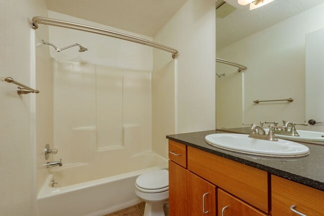 Building Photo - Light and Bright Second Level Condo Available Now!