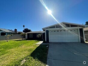 Building Photo - Newly painted Four Bedroom Two Bathroom Ho...