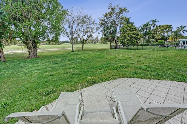 Building Photo - 6700 E Tropical Way