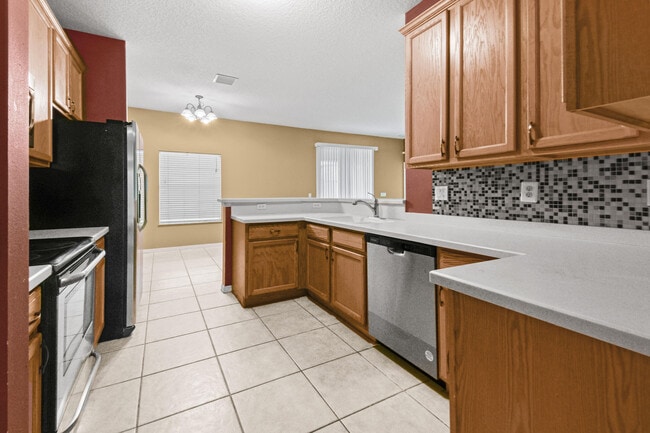 Building Photo - 6221 NW Hacienda Ln