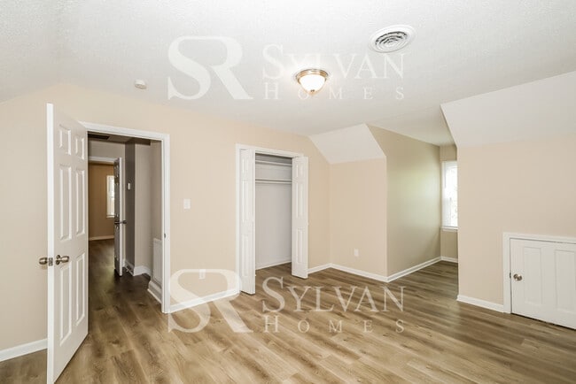 Building Photo - The living is easy in this 4 bedroom, 2 bathroom home