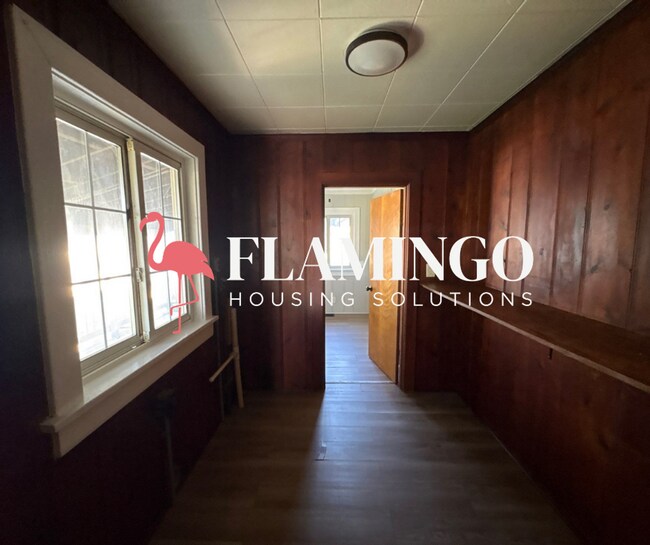 Building Photo - Charming 2 Bedroom, 1 Bath Home – Refinished Hardwood Floors, Detached Garage & More!