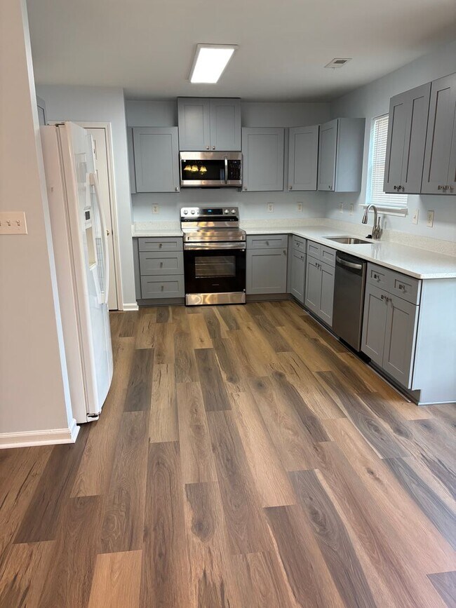 Building Photo - Updated Raleigh Home with Solar Savings & Fenced Backyard
