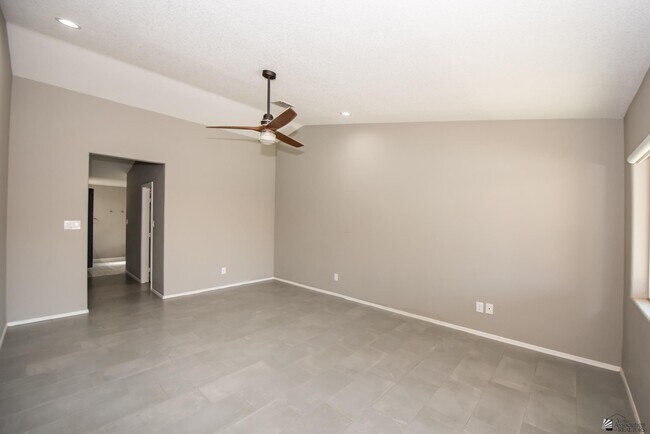 Building Photo - 8215 Forget Me not St