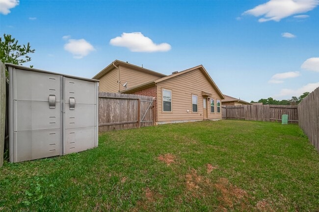 Building Photo - 23506 Umbrella Pine Dr