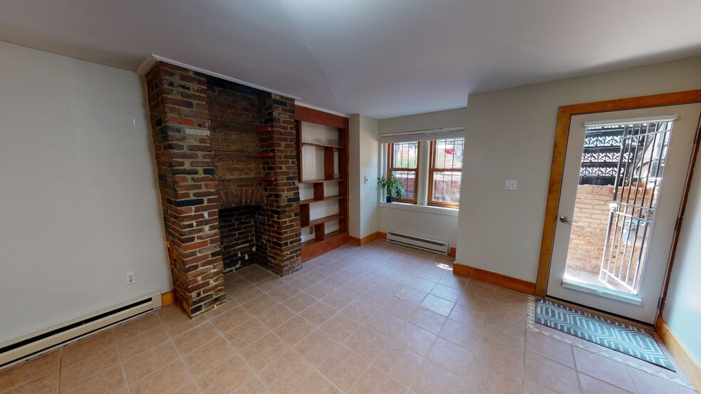 Maple wood work and (non-working) fireplace - 608 1/2 Acker Place NE