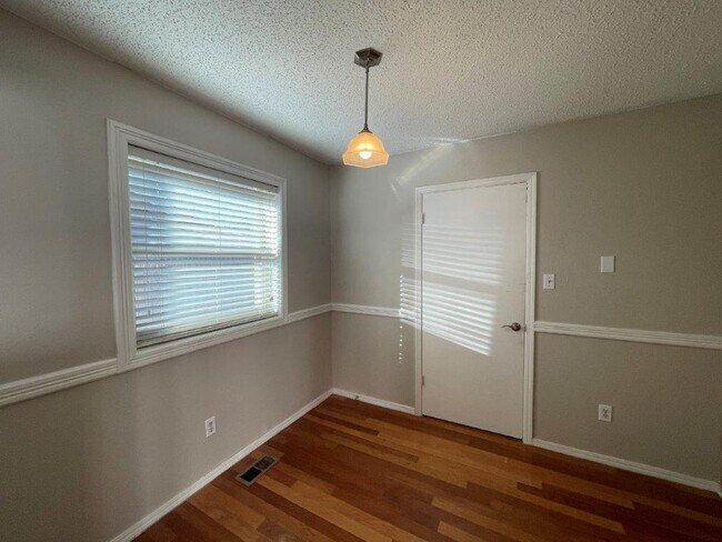 Building Photo - 3 bed 2 bath, 2 car with wood floors, fenc...