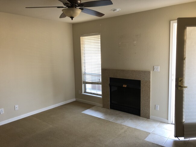 Living room/fireplace - 631 E El Camino Real