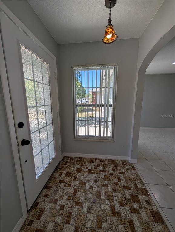 Building Photo - 6947 Bottle Brush Dr