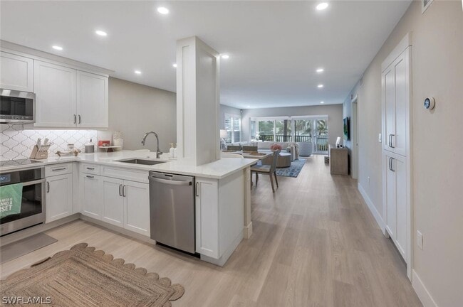 Building Photo - 6371 Pelican Bay Blvd