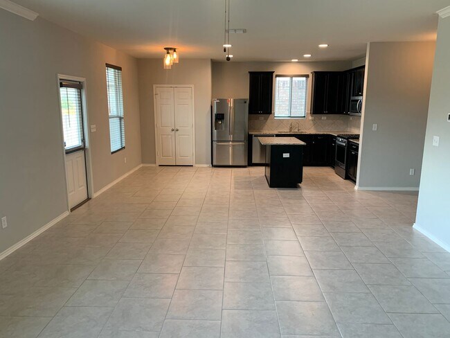 Building Photo - *COMING SOON* Spacious 4-Bedroom Home Near Briggs Ranch – Loft, Covered Patio & More!