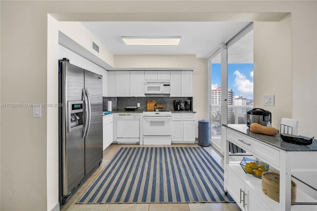 Building Photo - 6301 Collins Ave