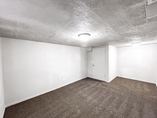 Building Photo - Spacious 5-Bedroom Home with Lofted Garage