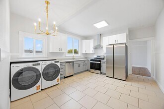 Building Photo - Stunning 2-Bed, 1-Bath Upper Unit in Longf...