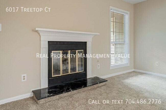 Building Photo - 6017 Treetop Ct