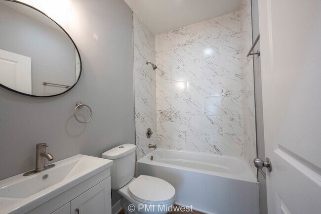 Building Photo - "Spacious 3-Bedroom Duplex with Granite Charm in Indianapolis – 1250 Sq Ft of Modern Living!"