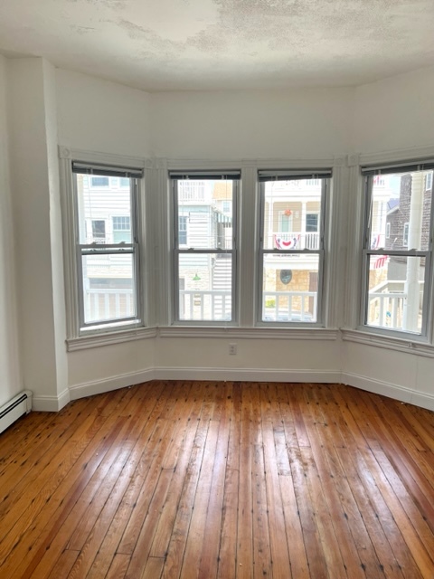 Spacious Bedroom, high ceilings hardwood floors - 24 Center St