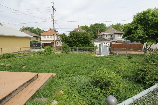 Building Photo - HUGE Historic Home with amazing fenced in yard and golf course views!