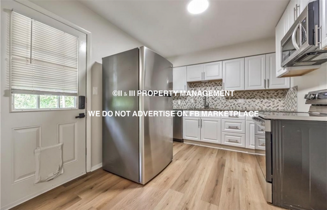 Building Photo - 10822 W 49th St
