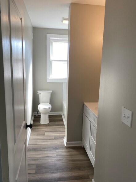 A second full bath is located on the Bedroom level - 308 Center St
