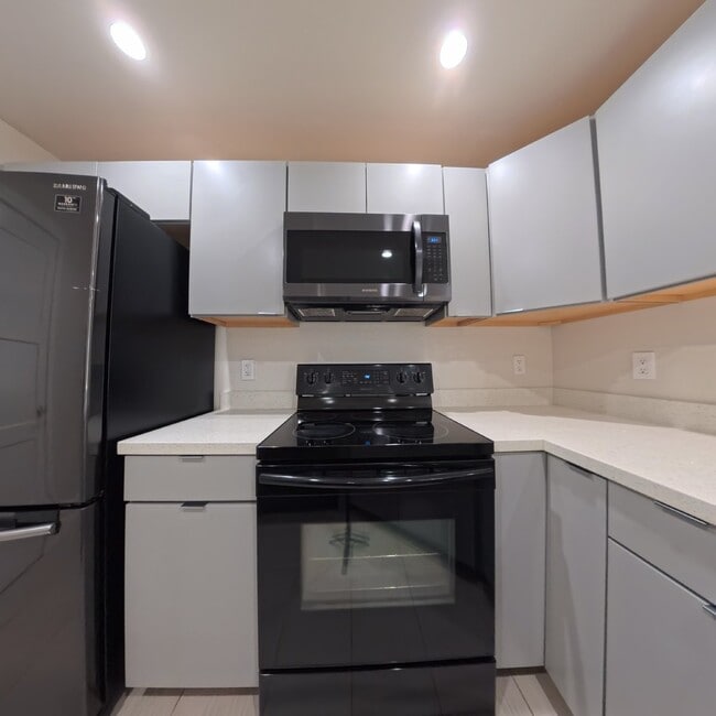 Building Photo - Highly Remodeled | Customer Closets | Gated Community