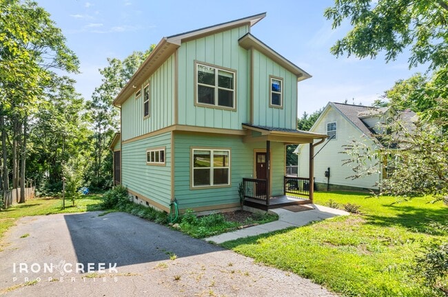 Primary Photo - Modern Three-Bedroom Home with Screened Po...